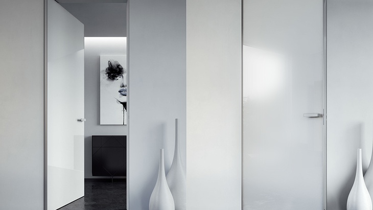 Reverzní dveře Doornite (dříve Masonite) se skrytými zárubněmi s 3x lakovaným bílým povrchem řady CLARA Reverzní dveře Doornite (dříve Masonite) se skrytými zárubněmi s 3x lakovaným bílým povrchem řady CLARA