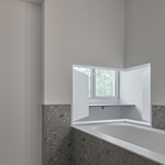 Kaskádový dům na hrázi. Novostavba, která se uměla usadit. Foto: MWA Hart Nibbrig