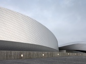 Budova dánského národního akvária připomíná velký vír