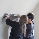 Proměna půdního prostoru na ložnici s použitím laminátové podlahy Quick-Step ze série Impressive