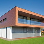 Rodinný dům v Rakousku s fasádním systémem StoTherm Wood, omítkou Stolit K6 a fasádní barvou StoColor Lotusan.